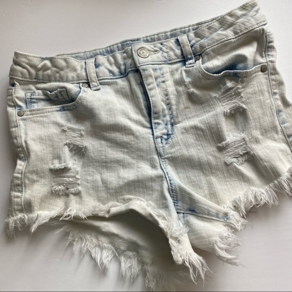 Altar’d State • Light Blue Destroyed Wash Raw Hem Jean Shorts